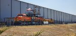 BNSF 3282 sits under the Wabtec Emissions Testing Rig with UP 5704 (C44ACM) Beside Her.